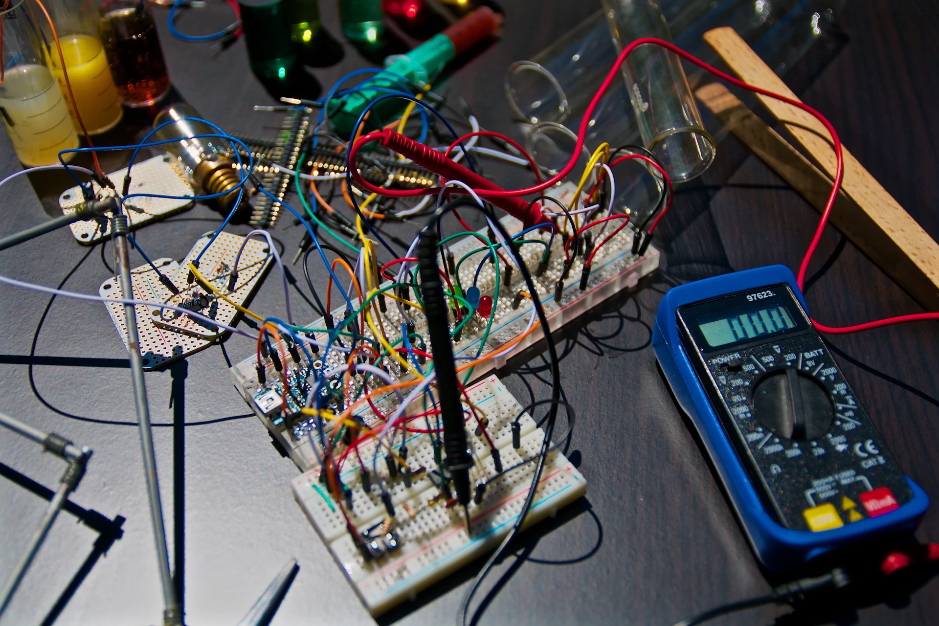 Circuit boards and test instruments on an electronics workbench
