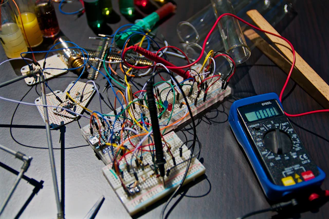 Circuit boards and test instruments on an electronics workbench