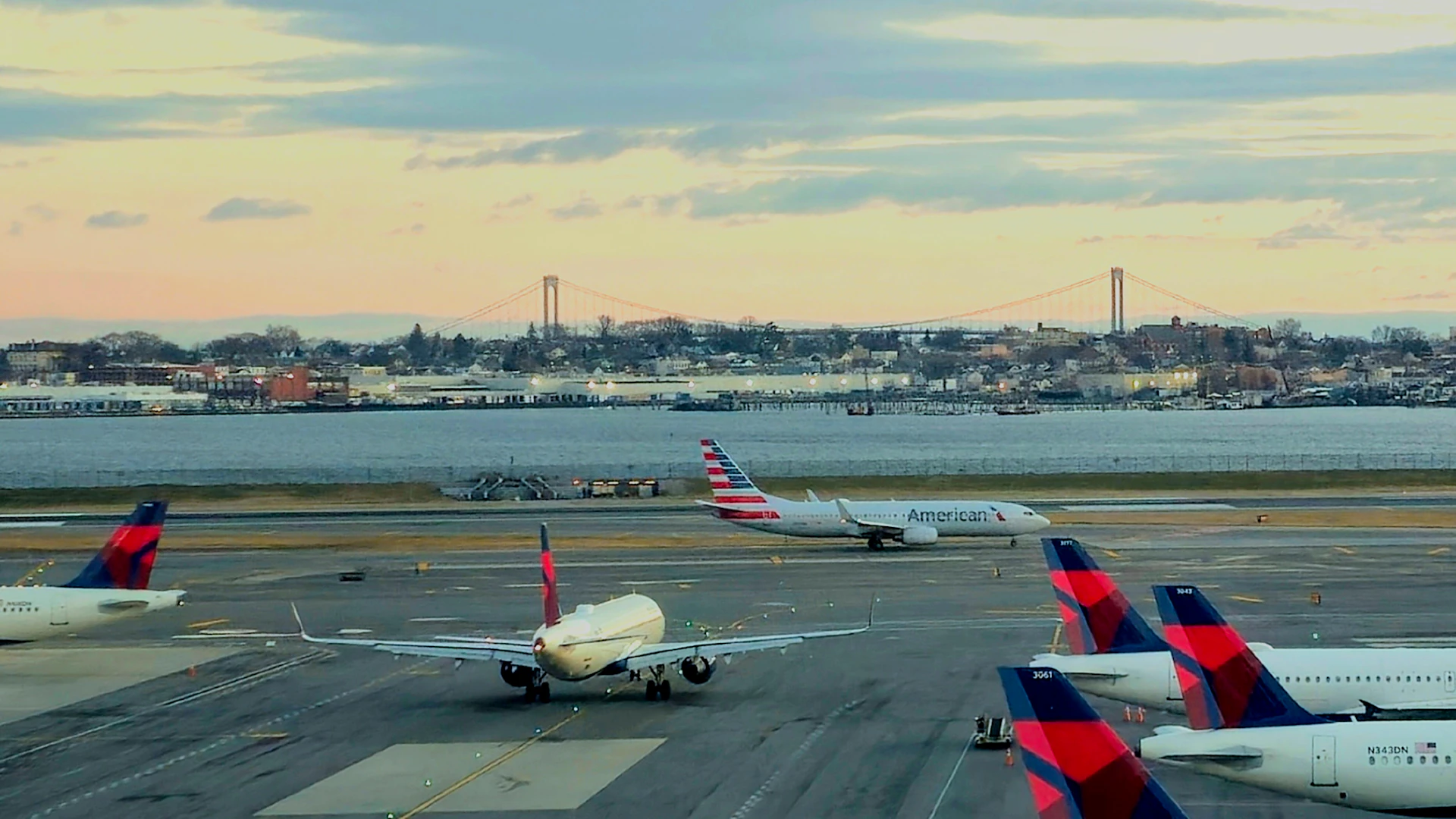 Aircraft at an airport terminal at dawn