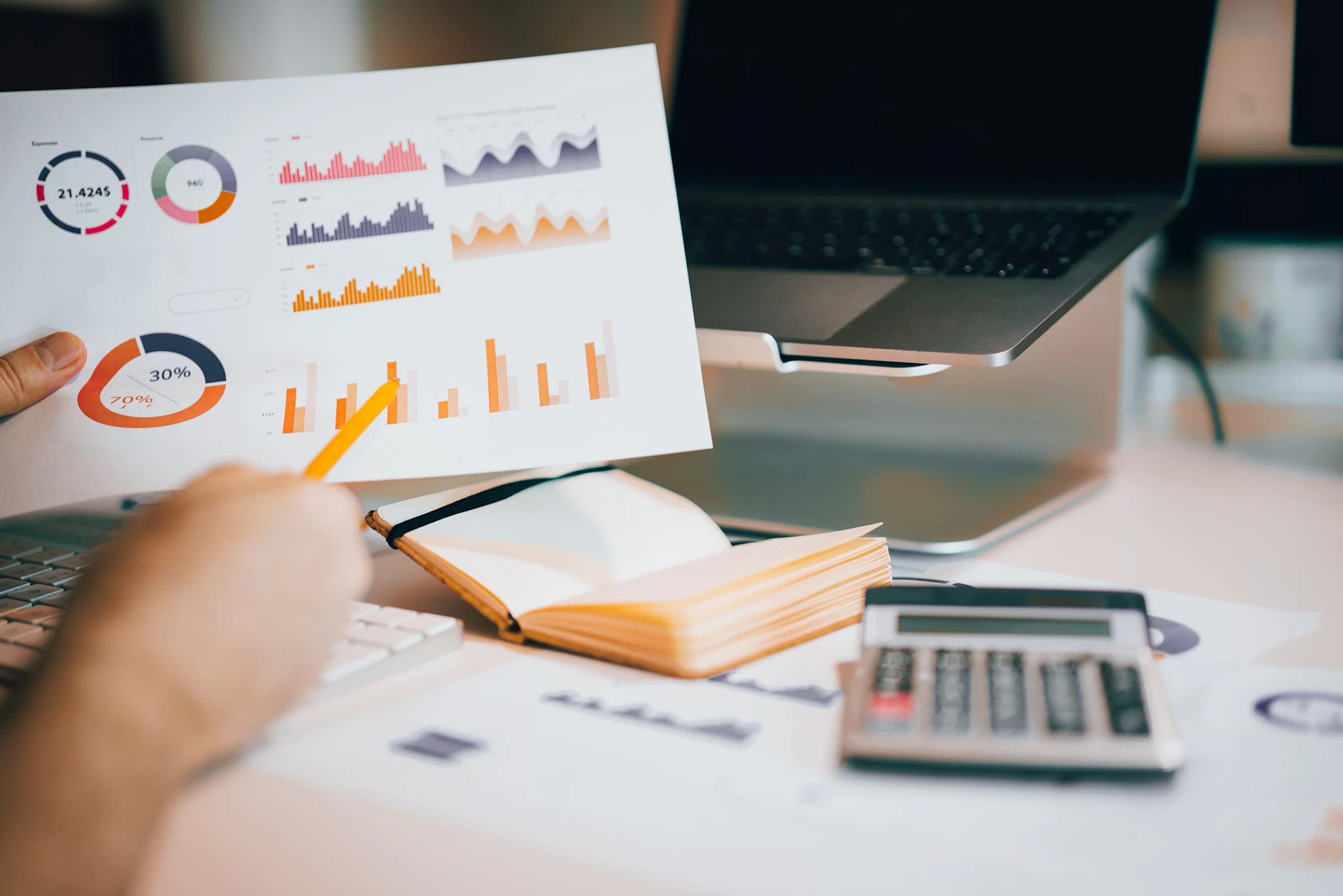 Financial reports and analysis on an office desk