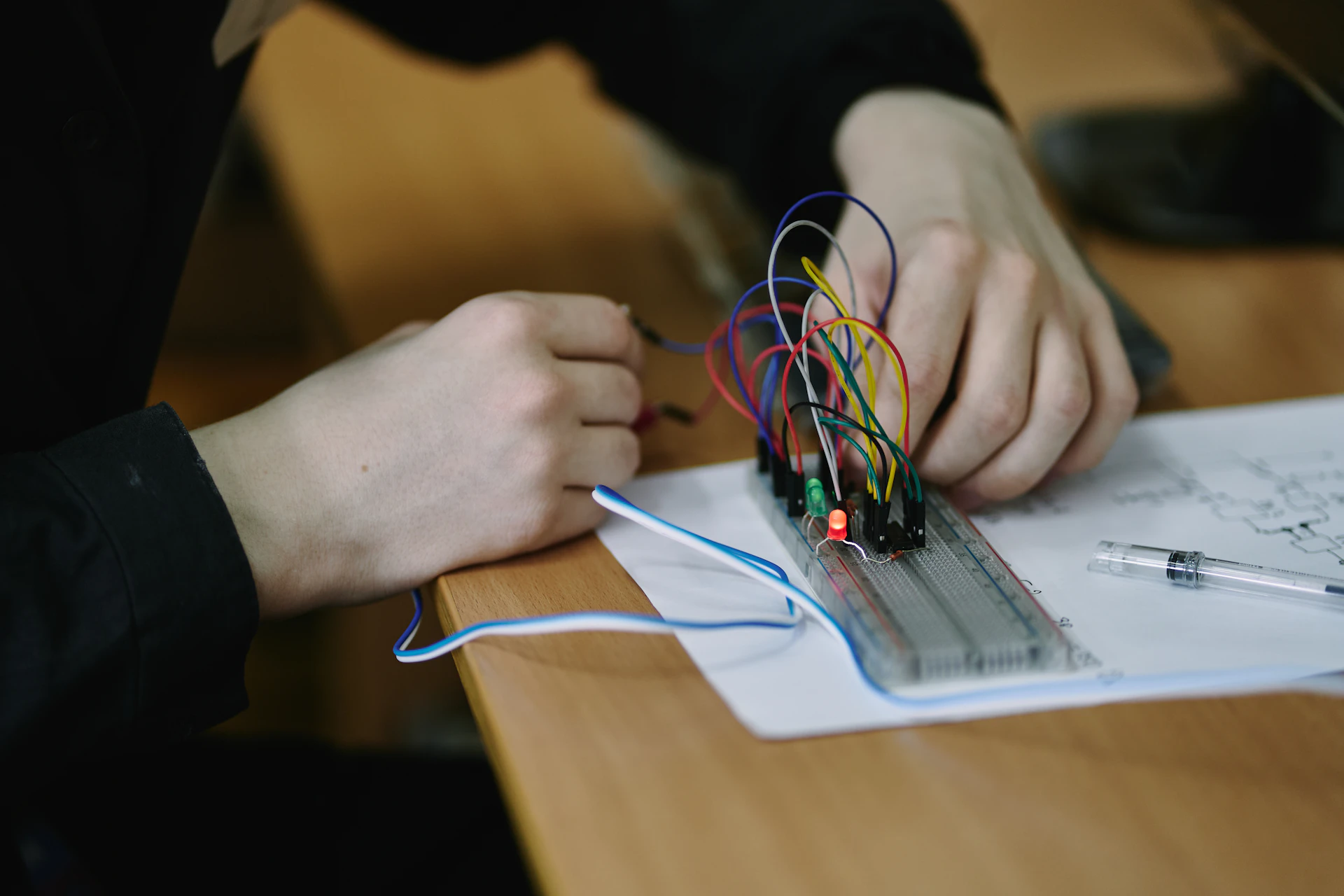 Engineer inspecting an electronic circuit board