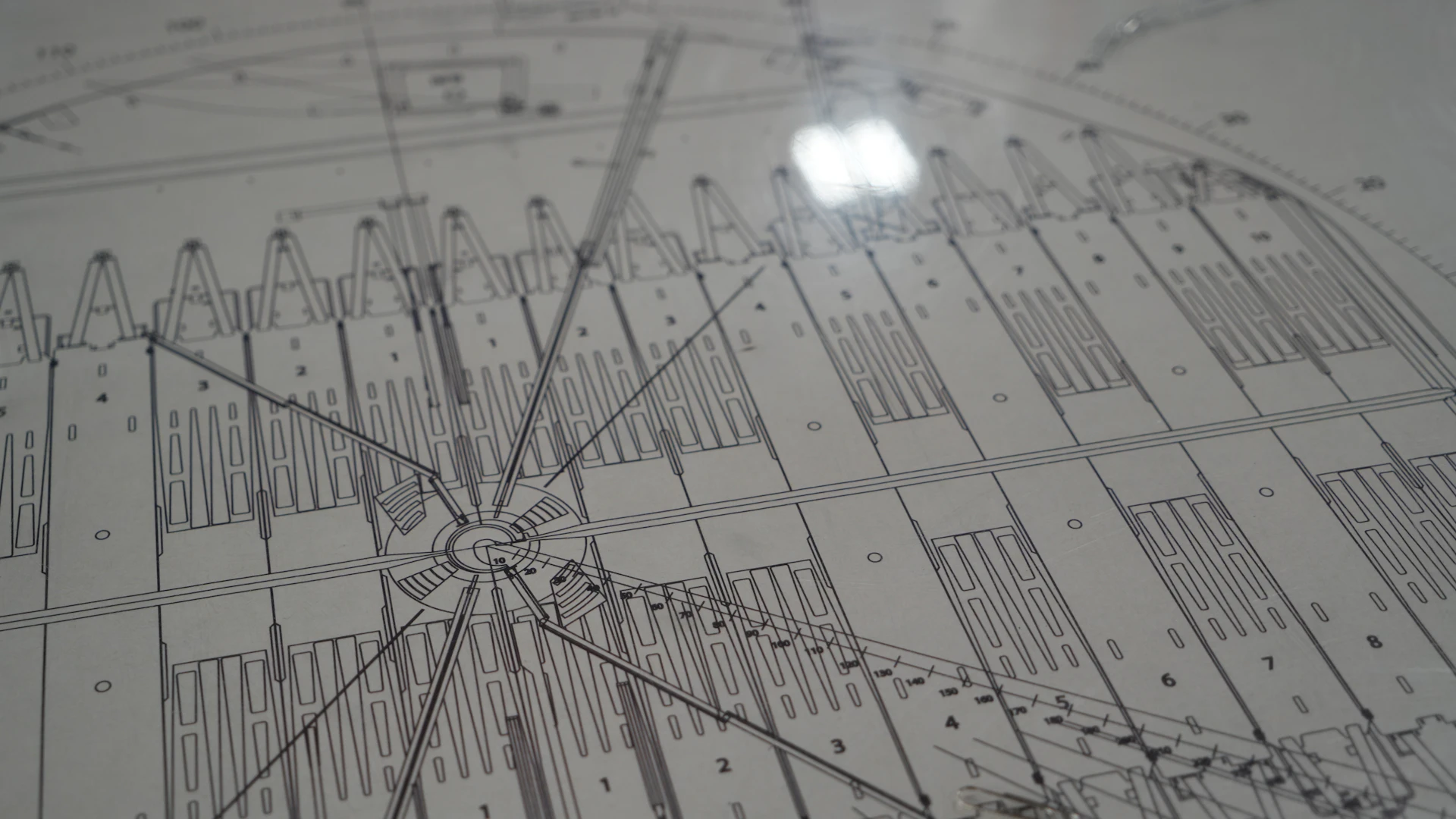 Scientific equipment diagrams in a physics research facility